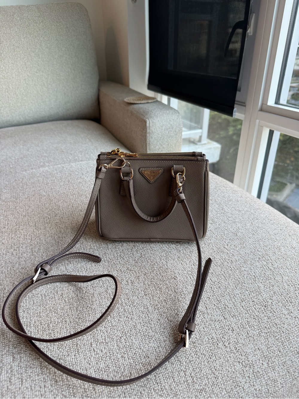 Prada Mini Saffiano Crossbody Bag in Taupe Brown with Gold Hardware